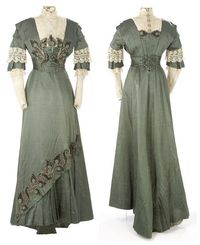 From the Glenbow Museum. 1910, custom made by Eaton's Department store in Toronto, Canada. From the Museum: "The skirt, which is longer in the back than the front, fits smoothly over the hips, but has an asymmetrical overskirt slanting from the hem to the knee at the side seam. The bodice is accented with a high lace collar, and a beaded and embroidered passementerie appliquéd above the waist."