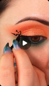 💜•Giulianna Maria•💜 on Instagram: "pumpkin queen 🧡 has anyone else already embodied by the spooky spirit!?  🍑 @gourmandegirlscosmetics perfect peach eyeshadow palette (dc giulz✨) 💚 @plouise_makeup_academy cute in coral and green with envy colored eye primers 🎃 @ardellbeauty 576 lashes 🌿 @nyxcosmetics epic ink liquid eyeliner, sage sparkes epic smoke liner  ••• #halloween2024 #eyemakeupideas #eyemakeuptutorial #halloweenmakeup #eyeliner #eyelinertutorial #graphicliner #makeuptrends #spookyseason #makeuptutorial glitter duochrome eyeshadow graphic eyeliner halloween costume makeup tips tutorial"