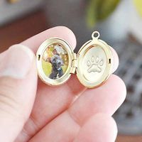 Now you can share the love with your fur babies too! Our dogs & cats are more than just pets, they are a part of our families and bring a special joy in a way that only they can. This locket makes a special gift to keep our sweet pups and kitties close.• This listing does not include a locket, this is for the stamping service only. Please add this listing with any locket in the shop to complete your order.The right side of the locket will be stamped with the paw print, with the option to also ha