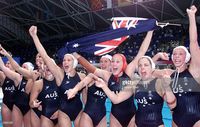 The Australian team celebrate their Gold medal win, in the Women's Water Polo match between Australia and the USA, at the Sydney 2000 Olympic Games, held at the Aquatic Centre in Olympic Park, Sydney, Australia. Australia 4 defeated Australia 3. DIGITAL IMAGE Mandatory Credit: Hamish Blair/ALLSPORT