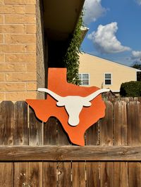 Show your Texas pride with this Texas Longhorn sign--perfect for your yard, man cave, or office.  Small: 20" x 19.5" Large: 24" x 23.5"  Order your custom piece and represent the Longhorns all season long!🤘  Follow Korinnas_Creations on instagram to view more designs and place orders DISCLAIMER: As a one woman shop each piece of carefully handcrafted with love and attention to detail, slight variation may occur, making every sign truly unique!  --Every sign is handmade from particle board. --Ea