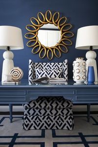 Home decorating ideas - Glamorous Navy blue, white and gold with dark navy accent wall, painted desk, white symmetrical table lamps, gold accent mirror and graphic navy and white patterns on rug and chair | Glamorous Galah - desire to inspire - desiretoinspire.net