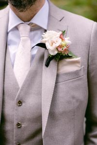 Late summer flowers make for such pretty boutonnieres, cream spray roses and pink antique hydrangea are used here.