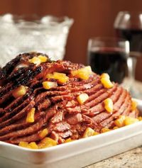 Crock Pot Ham. Cover the bottom of the crock pot with brown sugar. Place ham on top of the brown sugar and add pineapple tidbits with the juice. Sprinkle ham with more brown sugar. Cover and cook on low for 7-8 hours.