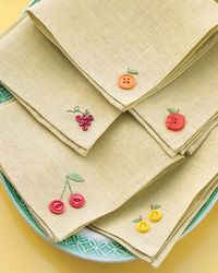 Buttons + threads = cute fruit napkins <3 Perfect for dressing up a spring or summer party w/o spending a fortune!: