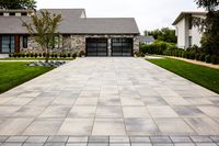 This driveway design is inspired by our Industria Smooth paver. A modern paver available in over 50 scale and color combinations, Industria is a popular choice amongst architects designing urban spaces. This paver's de-icing salt resistance and 100mm height makes it a reliable option for industrial, commercial and institutional applications. Industria Smooth paver has a sleek and smooth texture making it the perfect choice for any modern style project. Check out our website to shop the look!