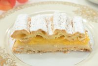 Apricot slices combine apricot curd, almond filling, pate brisee, and chou paste into a single pastry that is pefect for brunch or dessert.