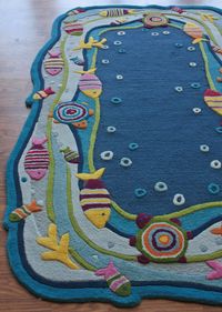 Kinder Under the Ocean Area Rug -in various rugs