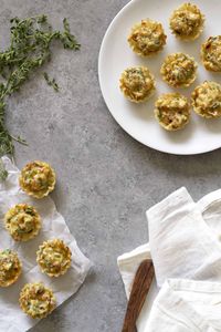 French Onion Tartlets Recipe -- Deliciously savory French onion tartlets made with flaky, crispy mini fillo shells and a creamy caramelized onion filling. The perfect appetizer for Thanksgiving or a holiday party! www.girlversusdough.com @girlversusdough #girlversusdough #partyfood #holidayappetizer