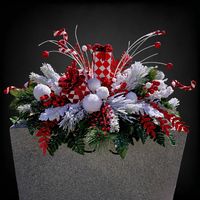 This Christmas Present headstone saddle is a wonderful grave decoration for winter! Our Christmas cemetery saddle is made with high quality faux floral silk grave flowers all mounted on a quality metal saddle frame with four legs and protective rubber coverings to protect and secure your headstone topper. Just bend legs inward to fit your particular headstone size.  This funeral arrangement measures approximately 32" long x 25" wide x 13" tall. It is perfect for a Christmas memorial and is ready to ship immediately with FREE SHIPPING!! Please check out Martin's on Facebook and our website. Thank you for your interest and we hope you will place an order with Martin's. You will be glad you did! Martin's Flowers are Long Lasting and come with excellent customer service.