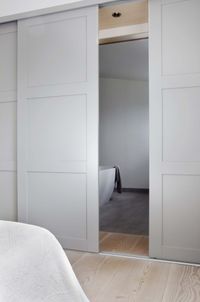 Dining Room to office/laundry 3 gorgeous sliding doors and wooden flooring in bedroom leading into ensuite. Love this