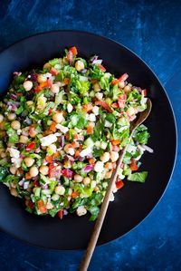 Mediterranean Chopped Salad Pitas- These delicious pitas are quick and easy to make and full of fresh vegetables.  Perfect for a healthy lunch or no cook summer dinner!