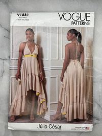 Description: Vogue V1881 sewing pattern from 2022 for a stylish halter neck dress by Julio César. Includes UNCUT and FACTORY FOLDED pattern pieces and instructions for: Misses' Dress: Halter neck dress with narrow neck ties, plunging V-neck bodice, and gathers under the bust. Features an empire waist seamed with a contrast band, flared skirt (cut crossgrain) with a high-low hemline, and a ruffled finish with contrast hem facings and side seam pockets. Details: Condition: Uncut and factory folded. Sizes: XS-S-M (Bust 29.5-36 inches, Waist 22-28 inches, Hip 31.5-38 inches). Fabric Suggestions: Rayon blends, poplin, challis, or other lightweight fabrics. Not suitable for obvious diagonals. Year: 2022. Shipped via Australia Post with protective packaging.