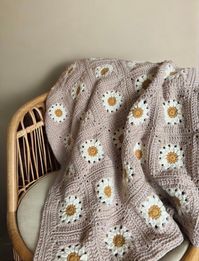 CROCHET CHUNKY DAISY THROW BLANKET! The perfect addition to any home! The sweetest gift! A practical item to wrap yourself in on those chilly days! A very SPECIAL heirloom piece that would be cherished for years and years! Yarn used is chunky & so beautiful! MEASUREMENTS: Throw Size 45" x 52" SHIPPING: 4-6 weeks. Lots of love & time goes into my crochet blankets. CARE INFO: This item is hand made so please hand wash & lay flat to dry if needed. Please keep in mind that all phone/computer screens