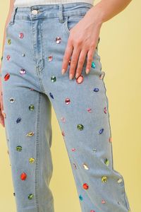 Make a statement in these multicolor embellished jeans, featuring bright bold large rhinestone colorful gems on a class mid waist design. Perfect for a unique and eye catching look. Stretchy