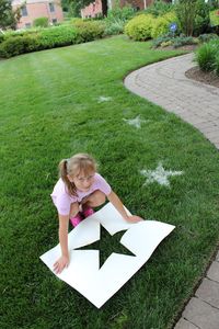 Stars on a lawn with flour and a home made stencil for a Rock Star Birthday party. Also planning to do it for the Fourth of July. Inspired by a picture  on Pinterest pinned from pinkandgreenmama.blogspot.com