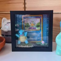 Oh hey Squirtle! 🐢 This guy sold super quickly at the craft fair last weekend, but I had to share him! This is the first of my experiments using actual card sleeves so you can swap the card out of the frame if you want. Would you like to see more card display frames? #SquidgeCreates . . . #squirtle #pokemon #pokemontcg #pokemoncards #handmadewithlove #kanto #starterpokemon