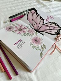 #bujo #bulletjournaling #july #butterfly These decorative fonts are typically styled with ornaments or patterns.