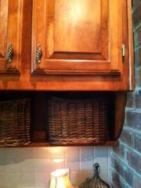 Dixie of all Trades: Hang baskets under your cabinets for extra storage