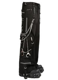 TOO MUCH HARDWARE? NOT EVEN A THING!🖤 ⛓️(ง •̀_•́)ง These black pants feature removable chains and handcuffs, a TRIPP NYC logo chain, adjustable ankles, studs, and deep pockets. – Drawstring and adjustable waist buckles allow for a tighter fit on the waist. 100% Cotton. Waist measurements are based on the waistband's full extension - that is the maximum inches that the waist will extend to. MODEL IS WEARING X-SMALL SIZE WAIST (Fully Extended) INSEAM XS 31 32 S 33 32 M 35 32 L 38 32 XL 41 32 XXL