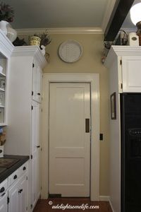 Love these swinging doors in older homes.