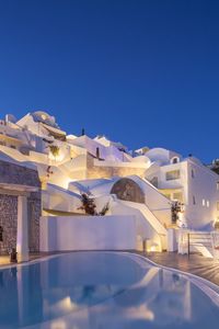 Santorini, white houses and pools