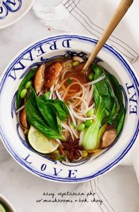 This easy Vegetarian Pho is SO flavorful and delicious! Totally vegan and gluten-free, it features a richly spiced broth that's packed with edamame, mushrooms, bok choy, noodles, and bean sprouts. | Love and Lemons #vegan #meatless #pho #soup #healthyrecipes