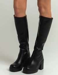 Soda Knee High Boots. Features A Faux Leather Upper. Round Toe. Platform Sole. Exterior Zipper For Easy On/off. Stacked Synthetic Heel. Approx. Shaft. 15.5" Approx. Heel Height: 3.5". Imported.