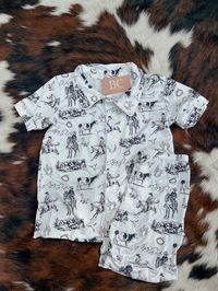 Dress your little one in the spirit of the wild west with our Western Cowboy Pajama Set for Kids. Expertly tailored for comfort and style, these pajamas feature classic western designs, ensuring your child enjoys both comfort and style. Perfect for bedtime stories or lounging on a lazy weekend morning, get yours today at Big Country's Western Wear!