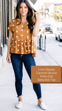 You are love this babydoll top so deeply! It's just so precious and sweet! The textured polka dot print is just so cute and we love that trendy babydoll fit! Plus, this top has all the fabulous fall coloring! This top features a round neckline, short sleeves, nonfunctional buttons down the back, a babydoll fit, and a textured pompom polka dot print.