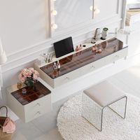 This floating makeup vanity delivers all the features you need to get your daily makeup done. Features with wall-mounted design and amber tempered glass top, different sizes of cutouts to cradle electric hair accessories, let alone ample storage of 3 drawers for your cosmetic products. The top panel can hold a phone or tablet, which is perfect for watching videos while doing makeup.