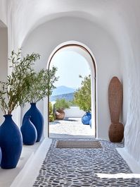 Sahara blue vases in an elegant Greek island-style interior design