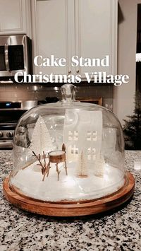 Cake Plate Village with Epsom Salt! so magical!  🎄The cutest little Cakestand Christmas Village! All you need is about 10 minutes to get this done once you have gathered your supplies. It's so charming on your kitchen counters!   I think the little reindeer are the MVP of my Christmas decor this year🦌  #Christmasdiy #christmasvillage #christmasdecor #christmaskitchen #kitchendecor   Music: Jingle Bells  • Musician: Kevin MacLeod  • URL:  https://filmmusic.io/song/3944-jingle-bells  • License: https://creativecommons.org/licenses/by/4.0/legalcode