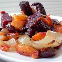 Roasted Beets 'n' Sweets | This has been s big hit each time I made it for "crowds" big and small. This is a great recipe for those that don't like sweet potatoes; the beet and onion medley tones down the sweetest of the sweet potatoes and turns it into a sweet and savory dish."