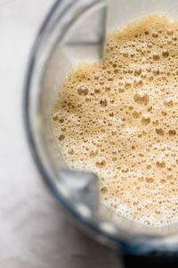 a bulletproof coffee protein latte recipe for a dreamy, creamy, healthy latte that is beyond delicious. this healthy bulletproof coffee latte is full of satisfying protein from your favorite whey or plant-based protein powder & healthy fats from coconut oil. the best part is how completely easy to make at home! paleo friendly. whole30 friendly. #playswellwithbutter #bulletproofcoffeerecipe #proteinlatte #proteindrink #healthycoffeerecipe #healthybreakfast #keto #ketodrink #paleobreakfast #paleod