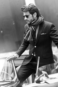 The moral man loves his soul, the ordinary his property. | Pinstripe #mensuit and scarf. #mensfashion #menstyle #classy #dapper #mensoutfit #dappermen #fashionphotography #fashionshot #blackandwhite