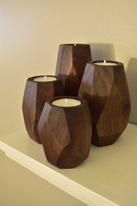 4 Faceted walnut tea light candle holders 3 tall 4 tall 5 tall and 6 tall solid black walnut finished with all natural beeswax.