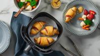 Want to take your favorite ham and Swiss sandwich to the next level? Why not whip up some tasty Air Fryer Ham and Swiss Crescent Rolls? This recipe requires just 3 ingredients and a few simple steps to make a delicious, stress-free dinner for the family—just fill, roll and bake to savory perfection in the air fryer!