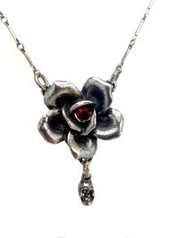 Rose with skull drop pendant