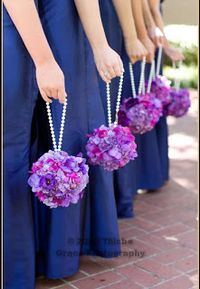 ball of flower arrangements for bridesmaids | The bridesmaids were given charming pomander balls attached to a ...