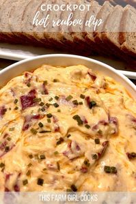 Hot Reuben Dip is an easy appetizer to make in your slow cooker or crock pot. Transform corned beef, sauerkraut and swiss cheese into a warm and hearty dip recipe! #cornedbeef #appetizer #reubendip