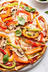 This delicious vegan almond flour pizza comes together with just a few simple ingredients. It’s crispy, easy to make, and perfect for adding all your favorite toppings!