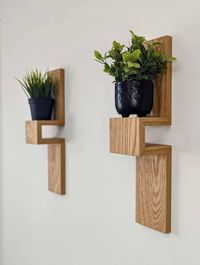 Elevate any space in your home with our midcentury modern inspired floating plant shelves. Designed to accentuate the wood's natural grain figure and tonal values, every shelf is hand made in shop and specifically tailored to bring life to your plants, naturally. These shelves were designed with a 3 1/2" plant pot in mind, but thanks to a myriad of design choices and clever placement, the flexibility is totally in your control. Choices matter! Which is why our shelves come made-to-order from man