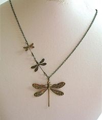 "Brass Dragonfly Necklace - Three Ornate Antiqued Brass Dragonflies in three different sizes, on an Antiqued Brass Chain. The large dragonfly is slightly over 1.5\" high x 2\" wide, the medium dragonfly is just under 1\" high x 1\" wide, and the smallest dragonfly is just under .75\" high x .75\" wide. These are stampings. The design is on one side. 20\" Length This necklace is also available in other metal finishes: http://www.etsy.com/shop/mcstoneworks/search?search_query=triple+dragonfly&