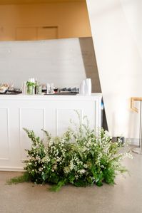 White delphinium, spirea, queen anne's lace, greenery floral hedge bar flowers