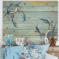 "Find the Designart - Blue Coastal crab Battle - Nautical & Coastal Print on Natural Pine Wood at Michaels. com. Designart - Blue Coastal crab Battle - Nautical & Coastal Print on Natural Pine Wood. Alas, a modern take on wood wall art. Once typically a wall art piece found only in rustic or farmhouse style decor settings, this Animals wood wall art will easily fit into even the most contemporary of designs. Using the highest quality 6 Color Canon UV Ink, this Nautical & Coastal wood wall art in