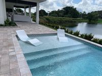 Aqua Chairs in-pool chaise loungers arrive in Delray Beach, FL. Year-round enjoyment on your tanning ledge in Florida. #aquachairs