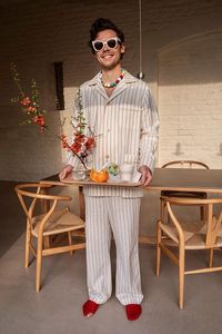 A slight break in the tailoring to see this fun photo of Harry in Gucci pyjamas. I'll mentin the artful pooling of the leg, which mirrors many of the trousers above.