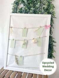 I used old frame to make wedding favor, decorated with natural flowers and seed paper cards. everyone can write a note to the wedding couple and it can be hanged as a memory at home