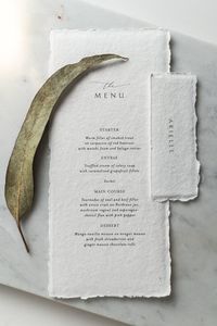 PRICES: 1 menu - 4€/piece from 50 menus - 3.50€/piece Minimum quantity: 50 pcs PAPER: handmade cotton paper (200gsm) SIZE: 4x9" included in the sample set: menu + place card - - - - - - - - - - - - - - -  Since this is made of handmade paper, each product may have small differences in shape and appearance - so each menu card is unique.  For questions or wishes just write us.